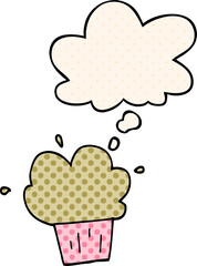 cartoon cupcake with thought bubble in comic book style