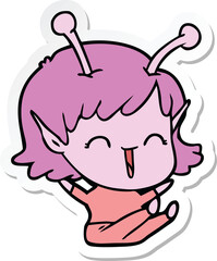 sticker of a cartoon alien girl laughing