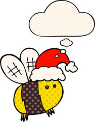 cute cartoon bee wearing christmas hat with thought bubble in comic book style