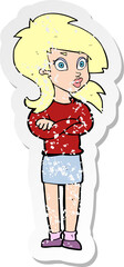 retro distressed sticker of a cartoon woman with folded arms