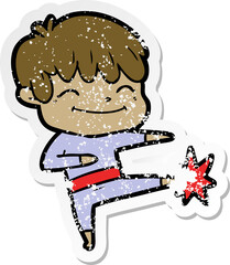 distressed sticker of a cartoon happy boy