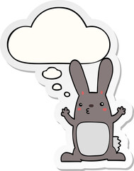 cartoon rabbit with thought bubble as a printed sticker