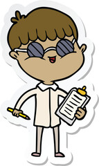 sticker of a cartoon boy wearing spectacles