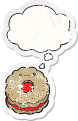 cartoon biscuit with thought bubble as a distressed worn sticker