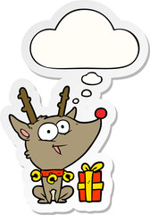 cartoon christmas reindeer with thought bubble as a printed sticker