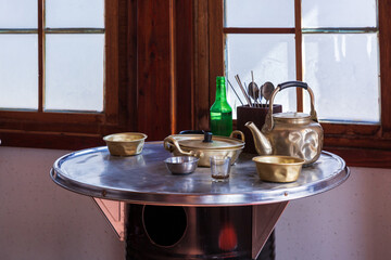 Makgeolli drink with Korean traditional food Pajeon on table Local Restaurant Korea travel