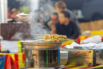 Fish cake skewers are sold in the Korean market.