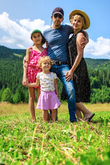 Obraz premium Family in the mountains tourists. Selective focus.