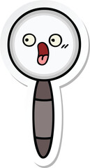 sticker of a cute cartoon magnifying glass