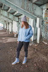 Portrait of a stylish woman in blue jacket