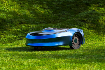 Innovative Robotic Lawn Mower Operating on a Bright, Sunlit Residential Lawn