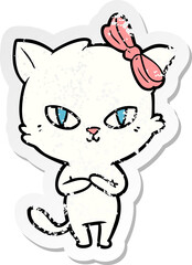 distressed sticker of a cute cartoon cat