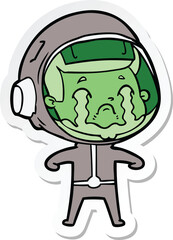 sticker of a cartoon crying astronaut