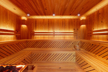 Luxurious Sauna Retreat with Modern Wooden Design and Warm Ambient Lighting