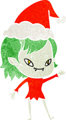 hand drawn retro cartoon of a friendly vampire girl wearing santa hat