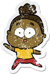distressed sticker of a cartoon happy old woman