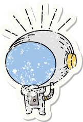 worn old sticker of a tattoo style astronaut