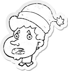 distressed sticker of a cartoon man wearing christmas hat