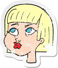 retro distressed sticker of a cartoon female face