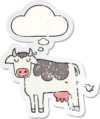 cartoon cow with thought bubble as a distressed worn sticker