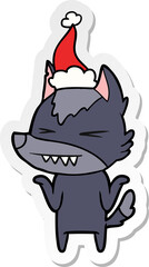 angry wolf hand drawn sticker cartoon of a wearing santa hat