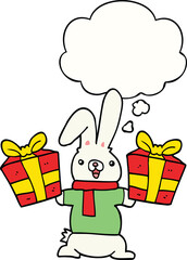 cartoon rabbit with christmas presents with thought bubble