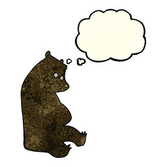cartoon happy black bear with thought bubble