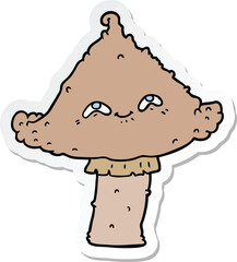 sticker of a cartoon mushroom with face