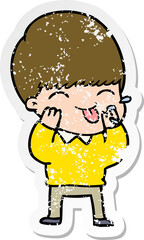 distressed sticker of a cartoon boy blowing raspberry