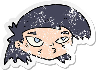 distressed sticker of a cartoon scratched up face