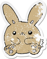 distressed sticker of a cartoon rabbit