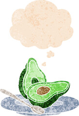 cartoon avocado with thought bubble in grunge distressed retro textured style