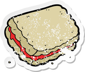 distressed sticker of a cartoon biscuit