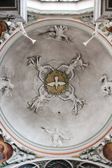 dove of peace with angels on the ceiling of a church