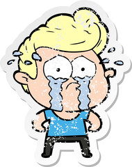 Fototapeta premium distressed sticker of a cartoon crying man
