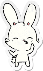 distressed sticker of a curious bunny cartoon