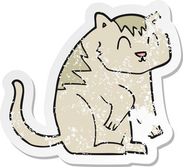 retro distressed sticker of a cartoon cat