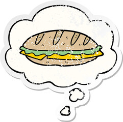cartoon cheese sandwich with thought bubble as a distressed worn sticker