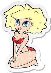 retro distressed sticker of a cartoon woman wearing bikini
