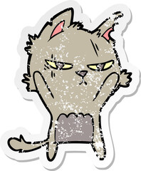 distressed sticker of a tough cartoon cat