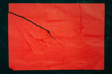 Red poster with folds as a background.