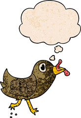 cartoon bird with worm with thought bubble in grunge texture style