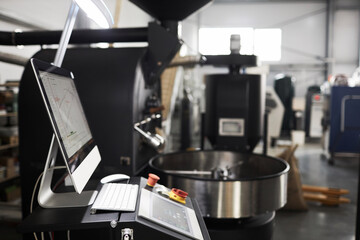 Fototapeta na wymiar Side view background image of machines and equipment in coffee roastery workshop, copy space
