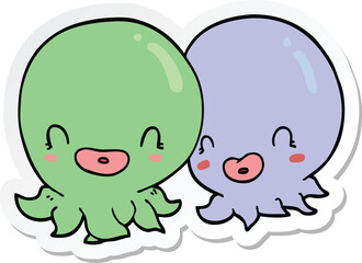 sticker of a two cartoon octopi