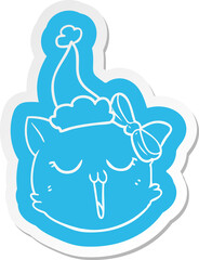 quirky cartoon  sticker of a cat face wearing santa hat