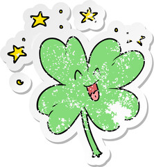 distressed sticker of a happy cartoon four leaf clover