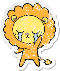 distressed sticker of a crying cartoon lion