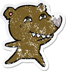distressed sticker of a cartoon bear showing teeth