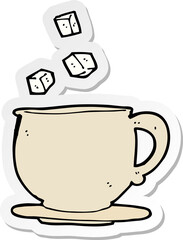 sticker of a cartoon teacup with sugar cubes