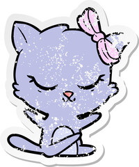 distressed sticker of a cute cartoon cat with bow